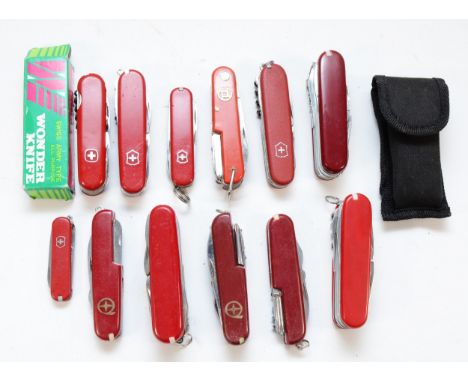A collection of Swiss Army type penknives. 