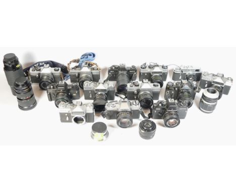 Fourteen SLR vintage film cameras to include a Praktica BCA, a Zenit E, a Minolta x-300 and a Zenit TTL. Together with six mi