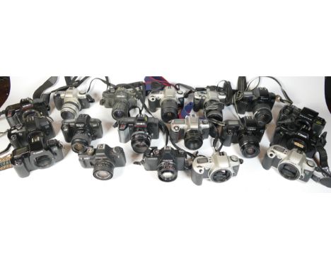 Twenty five SLR vintage film cameras to include a Cosina C1, a Canon EOS 1000f, a Centon K100 and a Nikon F65 