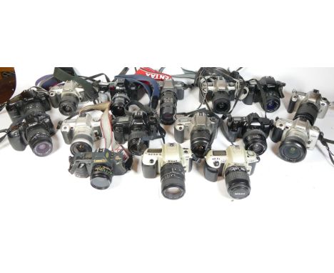 Twenty two SLR vintage film cameras to include a canon EOS 1000, a Canon EOS 500, a Nikon F50 and a Pentax P30 