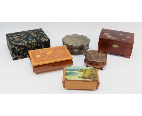 A collection of six jewellery boxes, circa mid 20th century, comprising four with musical movements, a faux tortoise shell he