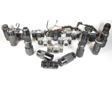 Eight SLR vintage film cameras to include a Mamiya MSX500, a Zenit 3m, a Praktica MTLS and a Praktica TL1000. Together with s