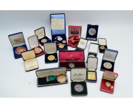 A substantial collection of medallions, primarily sporting related, silver plated, gold plated and nickel examples, dating fr
