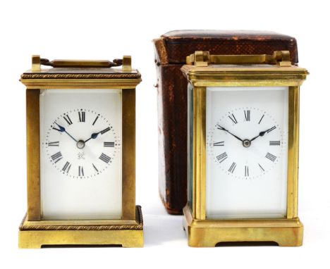 A 20th century brass case carriage clock, having 8 day movement striking on gong in traveling case, together with a French br
