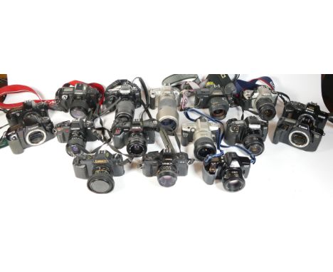 Twenty one SLR vintage film cameras to include a Minolta Dynax 4, a Nikon F55, a Canon T80, and a Canon EOS 650 