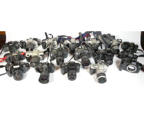 Twenty five SLR vintage film cameras to include a Canon EOS 5000, a Nikon F60, a Cosina C1 and a Minolta 500si 