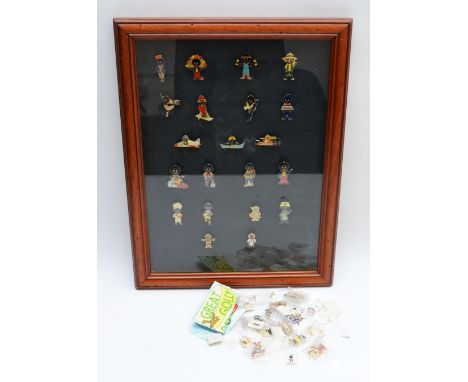 Collection of Robertsons enamelled Golly pin badges, loose and framed, circa mid 20th century and later.These items are liste