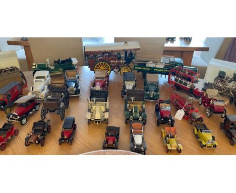 A large quantity of assembled plastic scale model vintage inspired vehicles to include two cased examples, a traction engine 