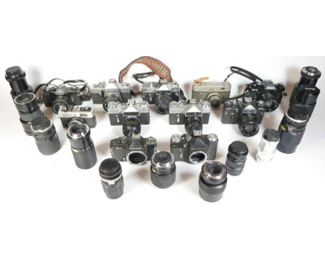 Eleven SLR vintage film cameras to include a Petri GX-1, a Ricoh KR-10, a Zenit EM and a Cosina CSR. Together with twenty thr