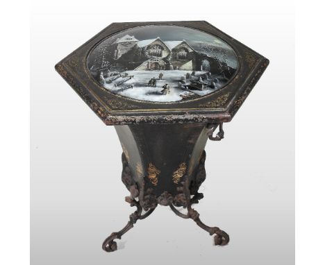A 19th century tole painted coal bin, with a hinged verre eglomise lid, painted with a winter landscape, having a removable l