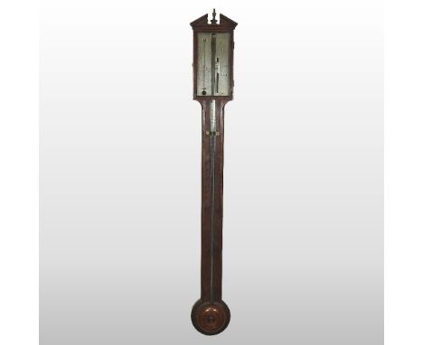 A late George III mahogany cased stick barometer, the silvered dial signed Ronchetti, Manchester, the satinwood and ebony str