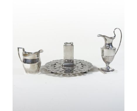 An early 20th century silver cream jug, Birmingham 1929, 9cm high, together with a silver plated cream jug, an engraved silve