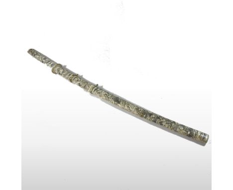 A late 19th century Japanese carved bone ceremonial katana, Meiji period, the sectional handle, and scabbard carved in low re