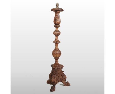 A Venetian style carved wooden floor standing lamp, decorated with scrolls, 110cm high overall