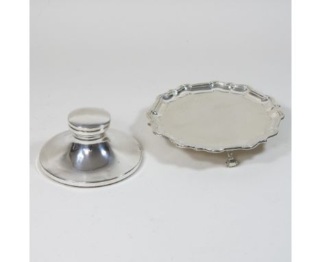 An early 20th century silver waiter, of circular shape, with a piecrust border, Sheffield 1933, 15cm diameter, together with 