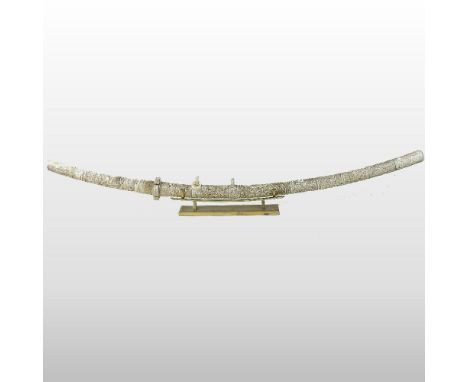 A fine 19th century Japanese carved ivory and bone ceremonial katana, Meiji Period, the sectional handle and scabbard finely 