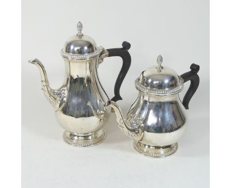 A modern silver coffee pot, of baluster shape, Birmingham 1981, 24cm high, together with a matching teapot (2)