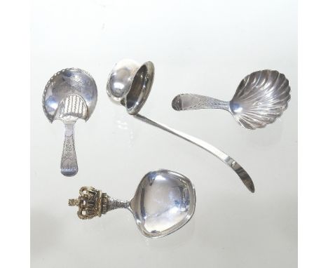 A George III silver caddy spoon, with a shell shaped bowl, London 1792, 8cm long, together with another, with bright cut deco
