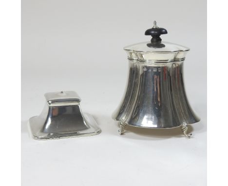 An Edwardian silver tea caddy, of tapered shape, on scrolled feet, Birmingham 1903, 196g gross, 13cm high, together with a si