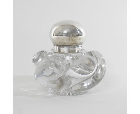 An Edwardian glass inkwell, of wrythen shape, with a hinged silver lid, by Mappin and Webb, Birmingham 1905, 12cm high