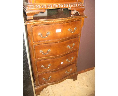 Small reproduction mahogany serpentine fronted chest of four drawers together with a pine wine table with circular top, turne