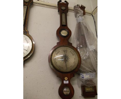 George III mahogany wheel barometer with silvered dial inscribed Beri and Dalera Leek