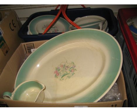 1930's Susie Cooper dinner service decorated with floral sprays and a green border (some damages)