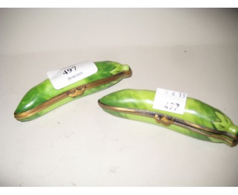Two Limoges metal mounted porcelain trinket boxes in the form of peas in a pod