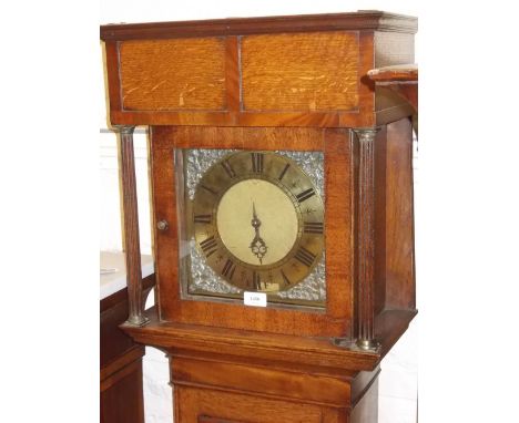 18th Century oak longcase clock, the square hood with brass dial, having Roman numerals and weight driven movement striking o