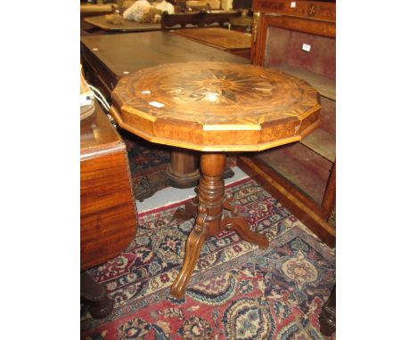 19th Century Continental walnut and parquetry inlaid pedestal table, the multi sided top with specimen wood inlays above a ba