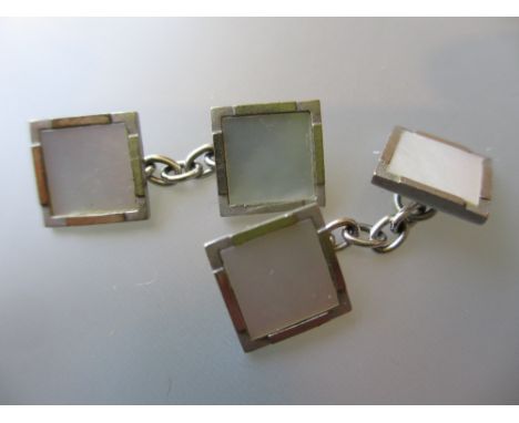 Pair of 9ct white gold and mother of pearl mounted cufflinks