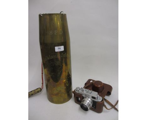 Falkland Islands commemorative shell case / gong together with a Russian 35mm camera