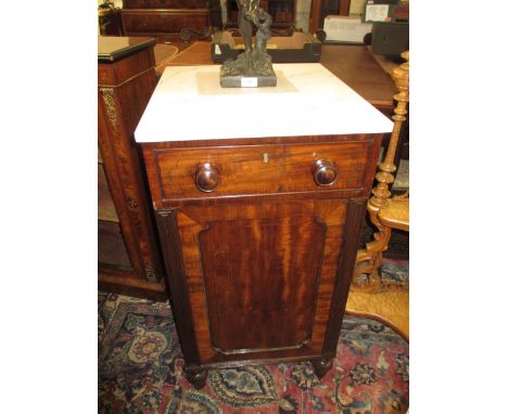 Pair of 19th Century mahogany pedestal cupboards, the associated marble tops above single drawer and cupboard door flanked by