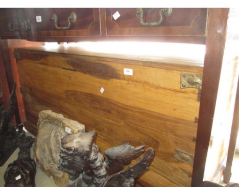 Large 20th Century camphor wood trunk having hinged cover on a plinth base