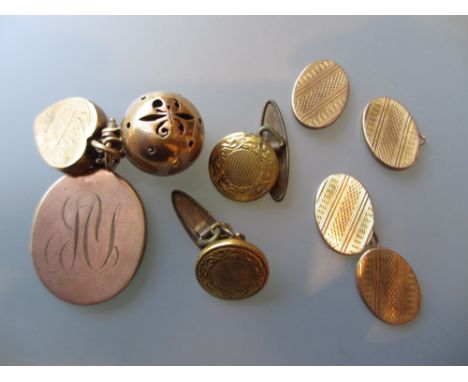 Two 9ct gold lockets, similar ball form charm, pair of cufflinks (a/f) and a pair of gold plated cufflinks