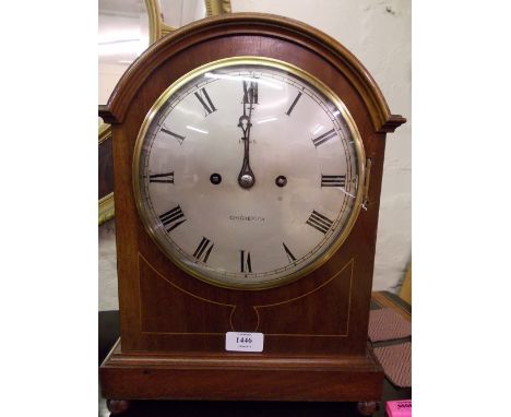 Edwardian mahogany and line inlaid bracket clock, the broken arch case with circular silvered dial and Roman numerals, signed