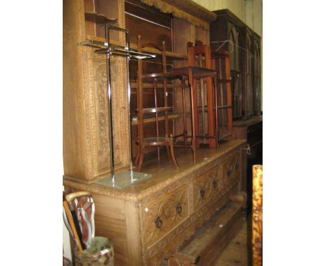 19th Century carved oak dresser with a boarded shelf back incorporating cupboard doors above a three drawer base on cabriole 