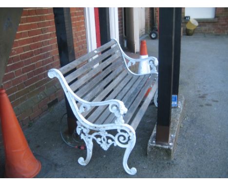 White painted cast aluminium and wooden slatted garden bench