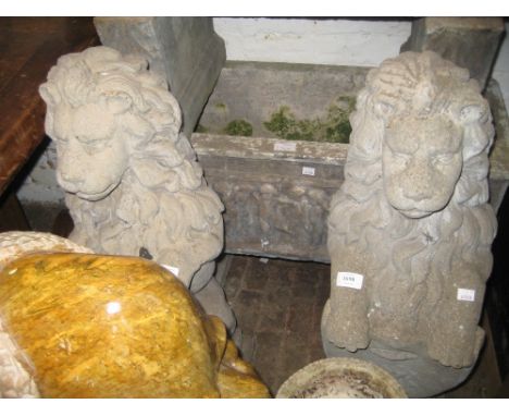 Pair of cast concrete garden figures of lions