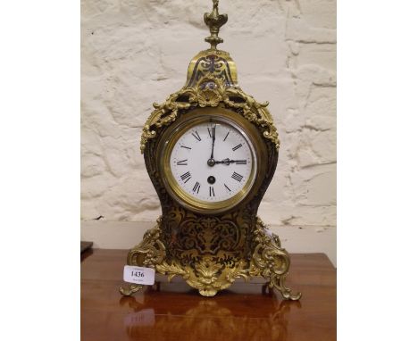Early 20th Century ebonised and buhl work mantel clock with gilt brass mounts, the circular enamel dial with Roman numerals a