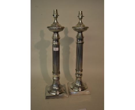 Pair of silver plated table lamp bases with fluted columns and square bases