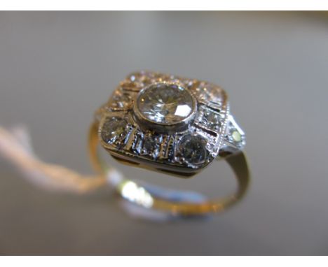 Art Deco style diamond set ring with centre stone in a square surround (approximately 0.7ct total)