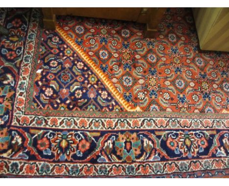 Large mid 20th Century Hamadan carpet with medallion and all-over Herati design on a red ground with borders, 12ft x 9ft appr