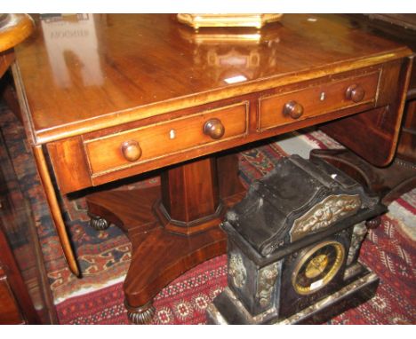 William IV or early Victorian mahogany drop-leaf sofa table with twin drawers and opposing dummy drawers with knob handles on