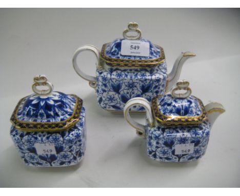 Early 20th Century Derby Lily pattern three piece individual tea service decorated in blue and gilt, the teapot 5.25ins high