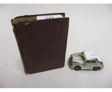 Early 20th Century Dunhill cigarette lighter in the form of a book and a Luckycar lighter in the form of a car made in occupi