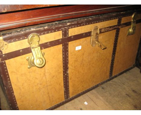Large early 20th Century travel trunk with marbled effect panels, stencilled London and with original label and tray, 22ins x
