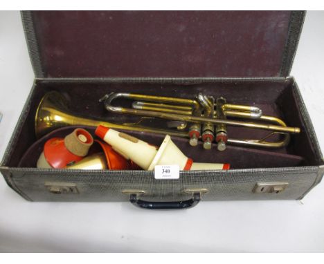 Cased trumpet by Boosey & Hawkes, London and a Hero harmonica in original box