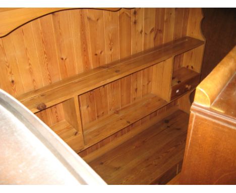 Small stripped and polished pine dresser with boarded shelf back incorporating two drawers, the base with three drawers above