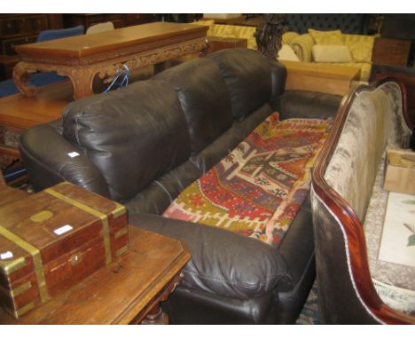 20th Century dark brown leather upholstered three seater sofa by Calia, Italia, raised on low splayed supports